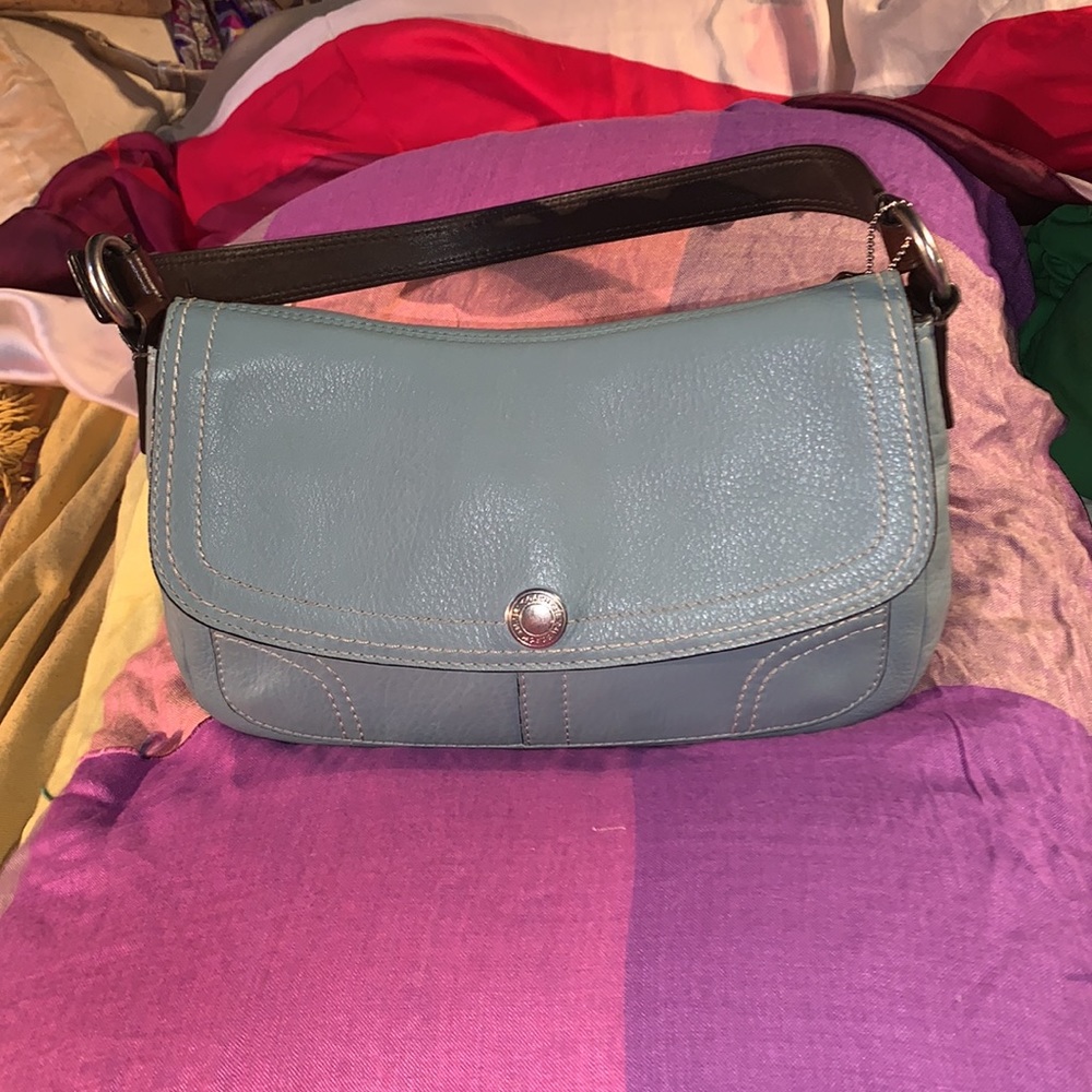 Super clean coach in a robins egg blue